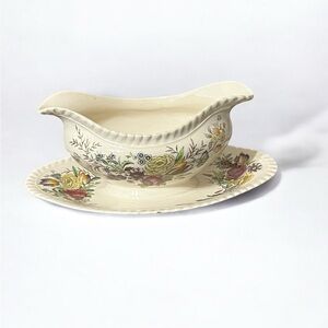 Johnson Bros Windsor Ware Garden Bouquet Gravy Boat with attached saucer.